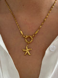 collar estrella dorado