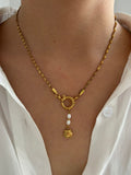 collar dorado concha y perla
