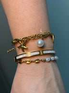Pulsera perla y estrella