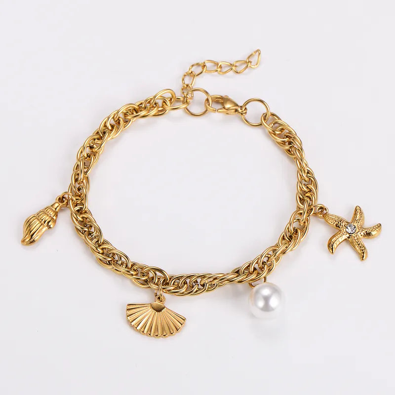 Pulsera perla y estrella